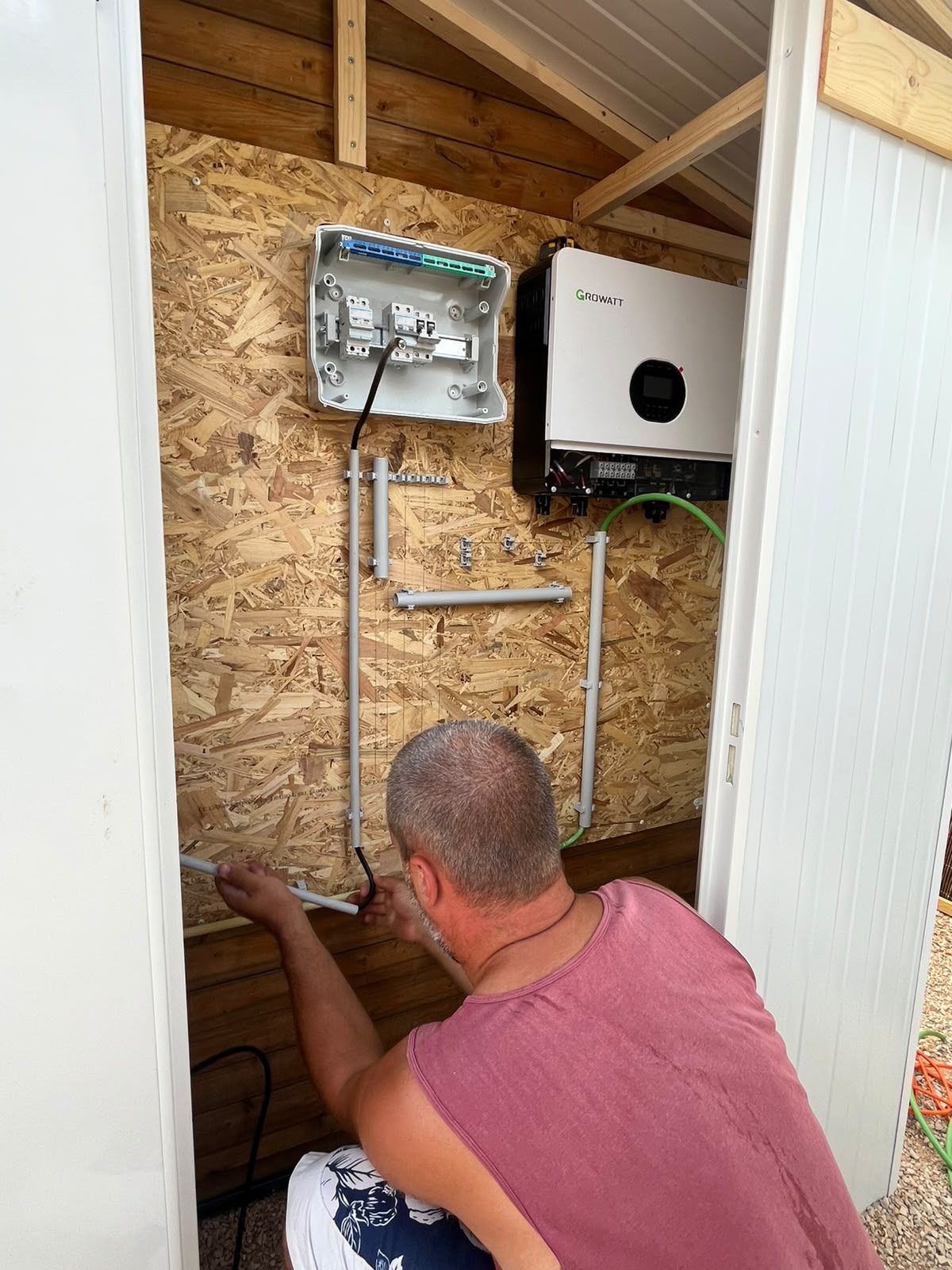 Growatt hybrid inverter and consumer unit installed in a technical cabin in Lagoa, Algarve