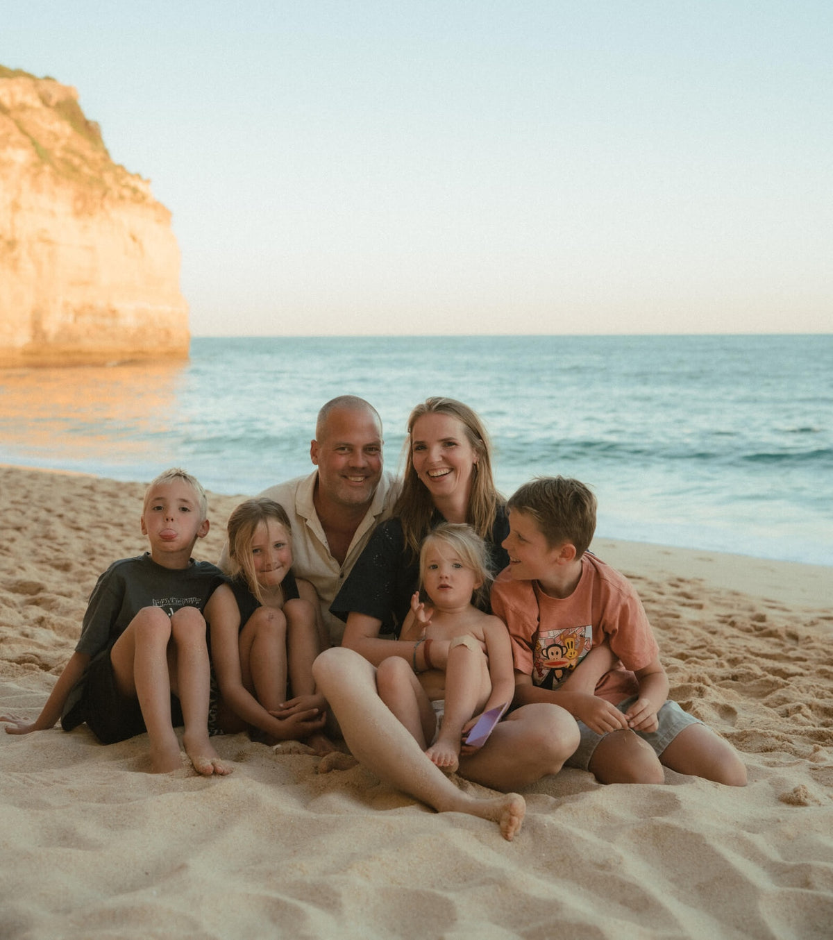 Liesbeth and Rik with their family on a beach in the Algarve, Portugal